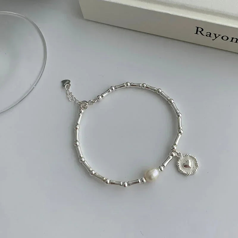 Silver Partial Pearls Knots Bracelet