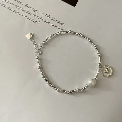 Silver Partial Pearls Knots Bracelet